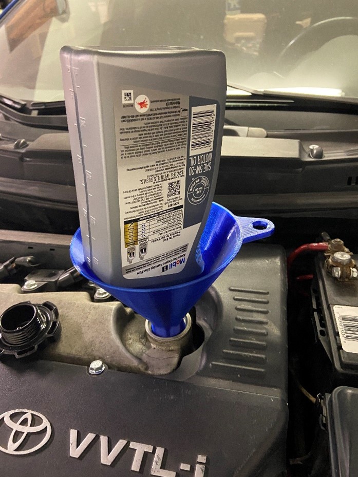 Funnel that can hold a quart of oil